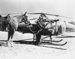 Hoot Gibson and Mrs. Elderbrook landing on Roland Wiley's Hidden Hills Ranch airstrip: photographic print