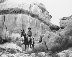 Fred Kennedy riding a gaited horse at Cathedral Canyon: photographic print