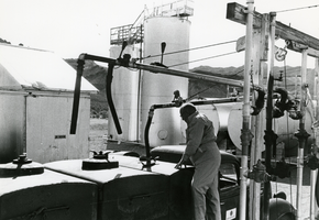 Art Revert filling a bulk truck at the Revert Brothers' Union Oil Bulk Plant, Beatty, Nevada: photographic print