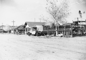 Car in front of a home in Beatty, Nevada: photographic print