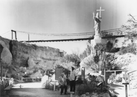 Suspension bridge and the statue of Christ at Cathedral Canyon, Nevada: photographic print