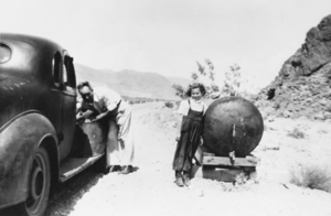Claudia Davies and her uncle, Jack Davies, at a watering tank on the west side of Daylight Pass, Nevada: photographic print