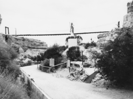 Suspension bridge and the statue of Christ at Cathedral Canyon: photographic print