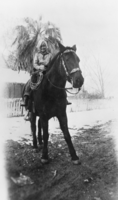 Betty Jean Hughes riding a horse: photographic print