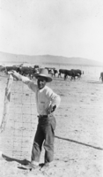 Joe Fallini next to a cattle corral: photographic print