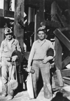 Bill Barrow and Albert Bradshaw at the collar of the Florence Mine shaft, Goldfield, Nevada: photographic print