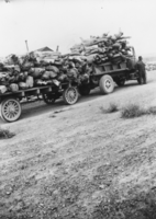 A.N. Bradshaw with a truck filled with firewood that had been collected in the mountains around Lida, Nevada: photographic print