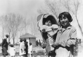Mayme Hooper holding her sister's daughter Lilly on Easter Sunday: photographic print