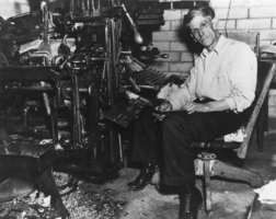 Clyde Rufus Terrell seated at the linotype machine at the Tonopah Times Bonanza: photographic print