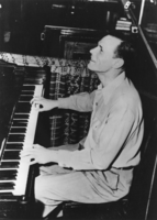 Negative: Roy Moore playing piano at the Ace Club, Tonopah, Nevada: photographic print