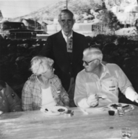 Jeanne Potts, Nevada Governor Paul Laxalt, and Don Potts (identified from left to right) at Jim Butler Park located in Tonopah, Nevada: photographic print