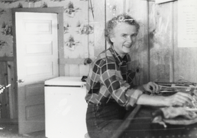 Jean Carver Duhme working at the grill at Carver's Station: photographic print