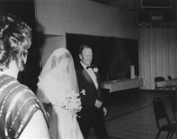 Richard Carver and daughter Marcy at Marcy's wedding held in the school gymnasium: photographic print