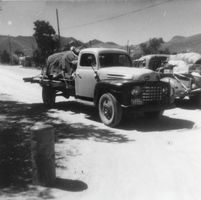 1941 Ford pickup flatbed truck belong to Karl "Skook" Berg heading for a camping trip: photographic print