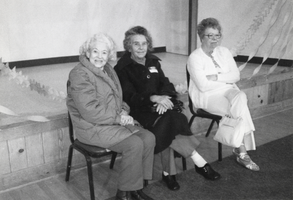 Three women sitting together at the Berg reunion: photographic print