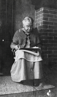 Grandma Berg, mother of Will Berg, reading : photographic print