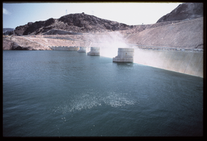 Water builds up along the Arizona spillway, looking north-northeast at Hoover Dam, Arizona: photographic slide
