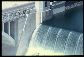 Water flows over the Arizona spillway, looking southwest at Hoover Dam, Arizona: photographic slide