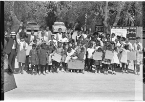 Set of photographs including girl on 300 Madison, Larry's Bowling team, children at Las Vegas Revival Center: image 001