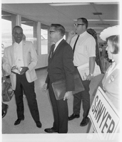 Set of photographs including Elks Lodge, bar interiors, and Grant Sawyer's arrival at airport: image 001