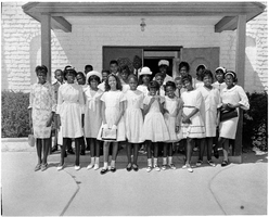 Set of photographs including Good Audry Jeane [?] at Convention Center, class at Zion, AM and N Choir, Easter program at Madison, Food Committee at Jo Mackey, and Reverend Kemp in bed at his home: image 001