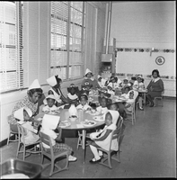 Set of photographs including New Jerusalem members in old church, accident at Dunes, Operation Independence Day Care D & Washington Street: image 001