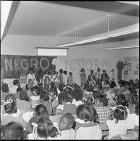 Set of photographs including NAACP Voter Registration at Gilbert, and Negro History Program at Kit Carson: image 001
