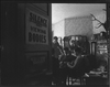 Card game in a morgue: black-and-white photographs