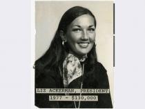 Typed text attached to front of image: "Liz Ackerman, President; 1977 - $130,000"