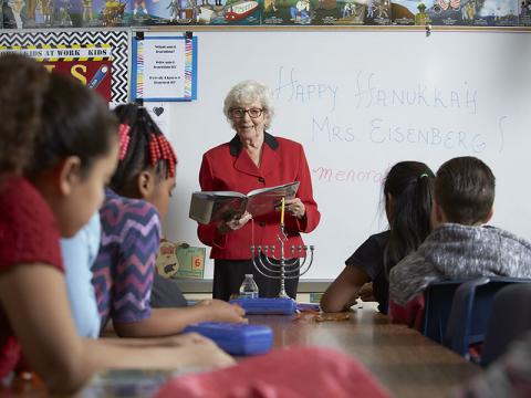 Longtime Las Vegas resident Dorothy Eisenberg reads to fourth-grade students attending the school bearing her name. 
