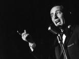 Photograph of Joey Bishop singing onstage at the Copa Room in the Sands Hotel, Las Vegas, circa 1960s