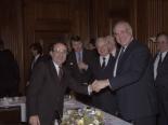 Film negative of Senator Chic Hecht shaking the hand of German Chancellor Helmut Kohl (Senator Robert Byrd at center), February 
