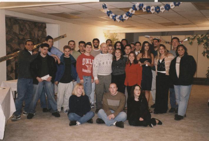 Photograph of Hillel students at Chanukah auction, circa 1995