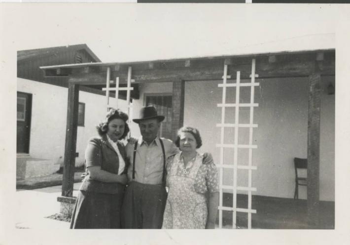 Photograph of Al Salton (center) with family, before 1944 Photograph of Al Salton (center) with family, before 1944