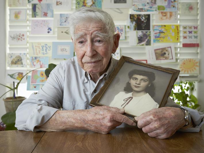 Jerry Countess with portrait of his wife, 2016