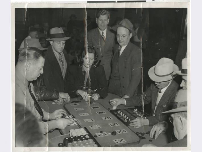 Photograph of people playing Faro game at Golden Nugget, 1930s