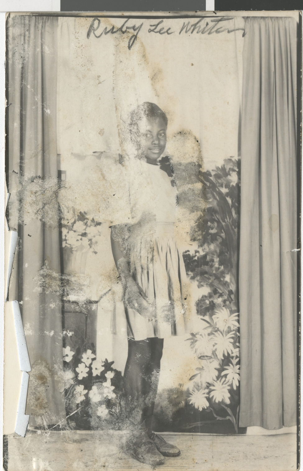 Black and white (sepia) photograph of Ruby at age 12