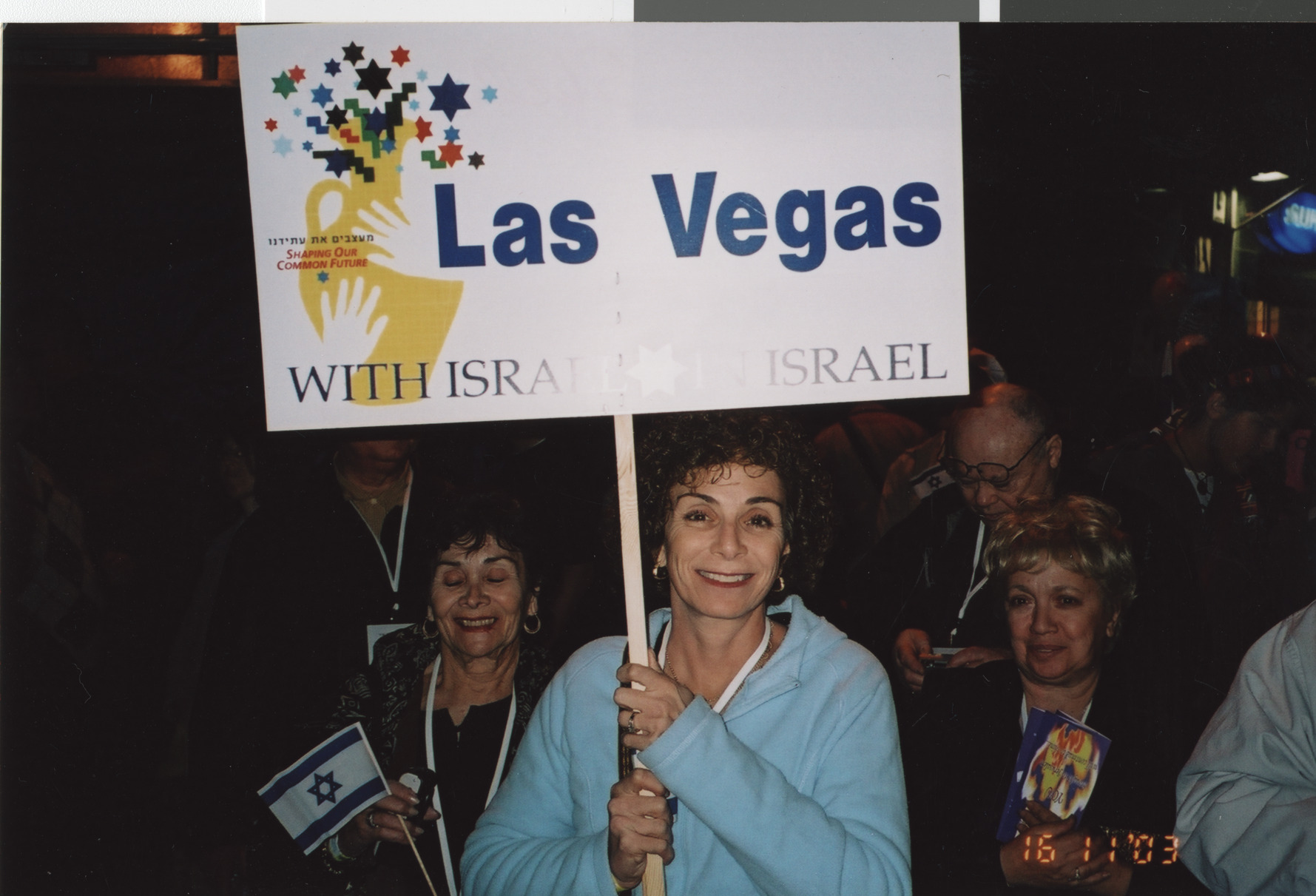 Photograph of Shelley Berkley with Las Vegas for Israel placard, November 16, 2003