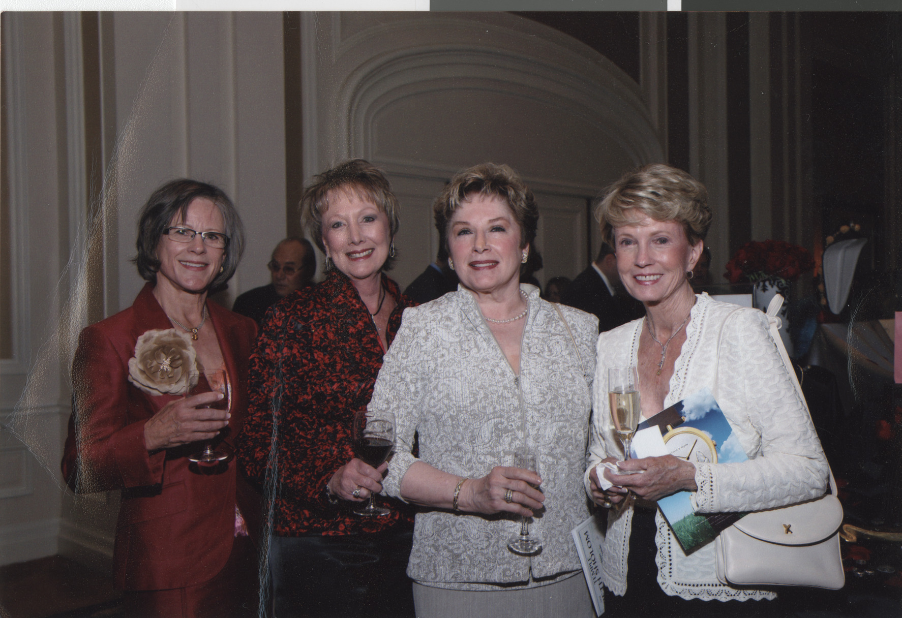 Photograph of a group of women at the Gala dinner honoring Flora and Stuart Mason, April 2008