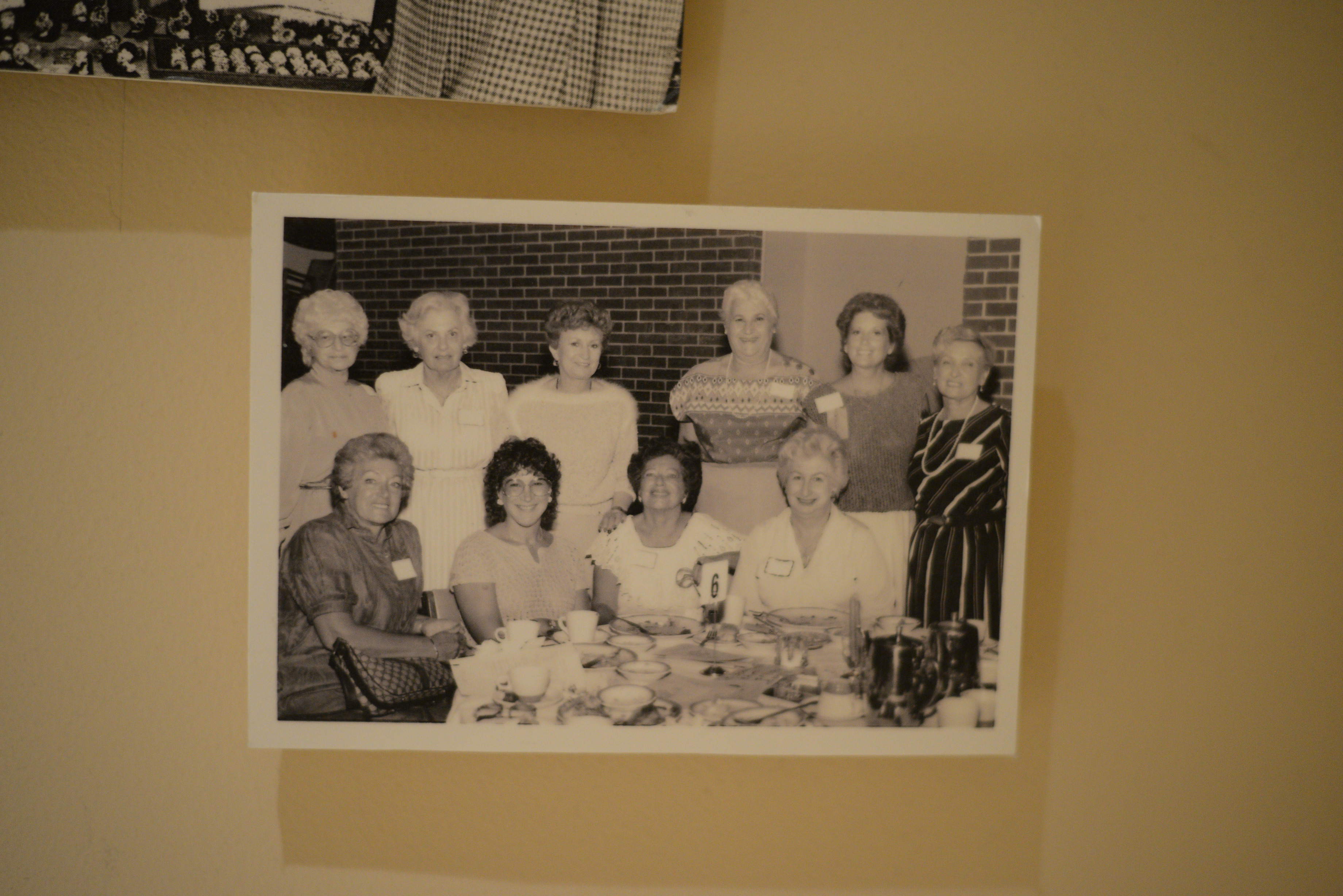 Photograph of a group of women at tea party, date unknown