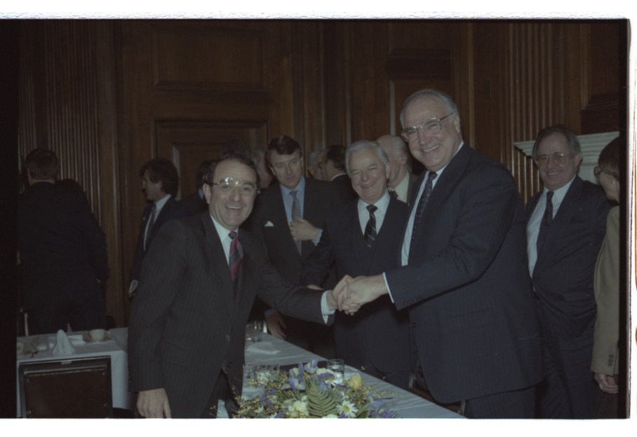 Film negative of Senator Chic Hecht shaking the hand of German Chancellor Helmut Kohl (Senator Robert Byrd at center), February 18, 1988