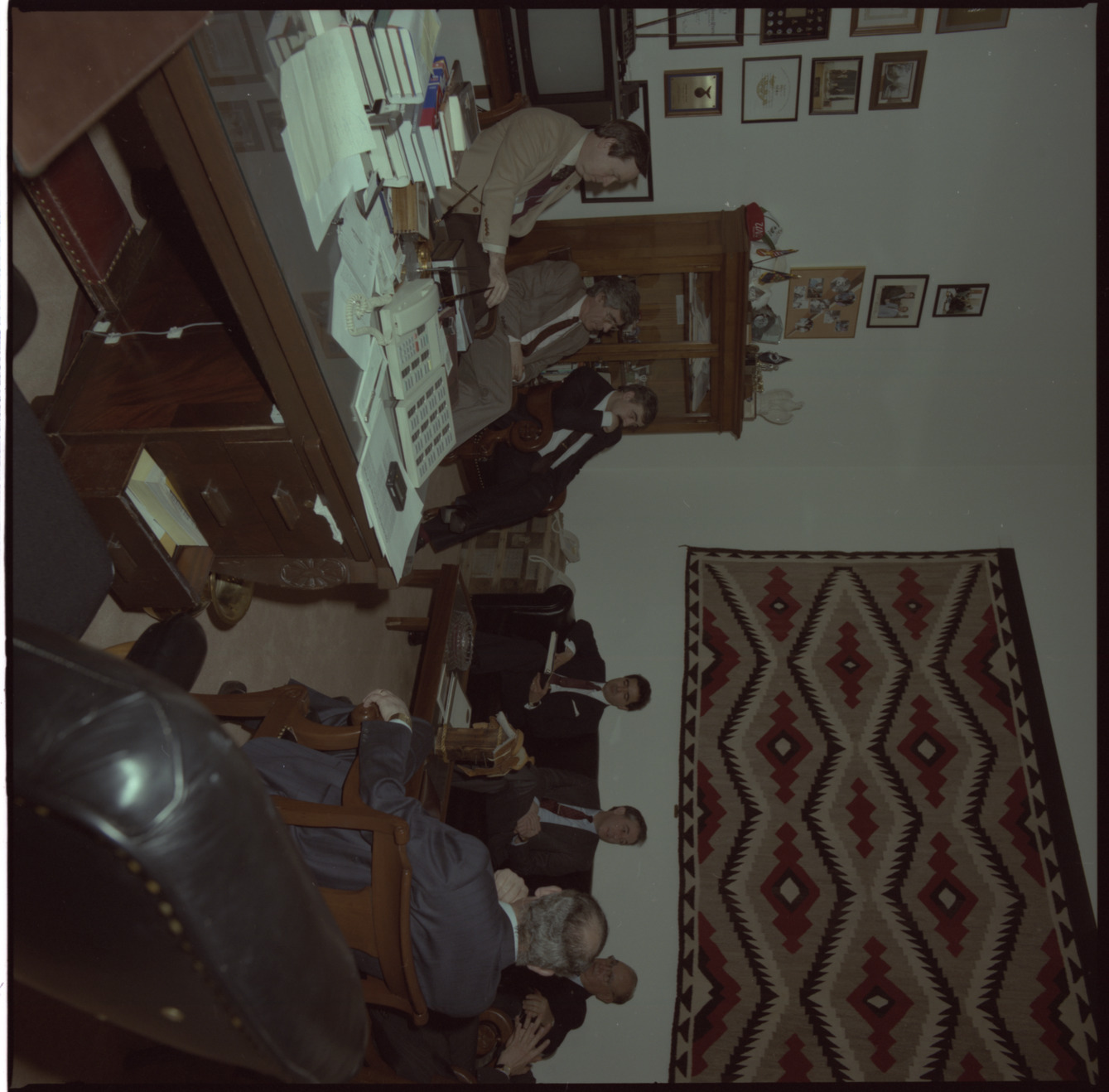 Film negatives of a meeting in the office of Senator Chic Hecht, March 22, 1988