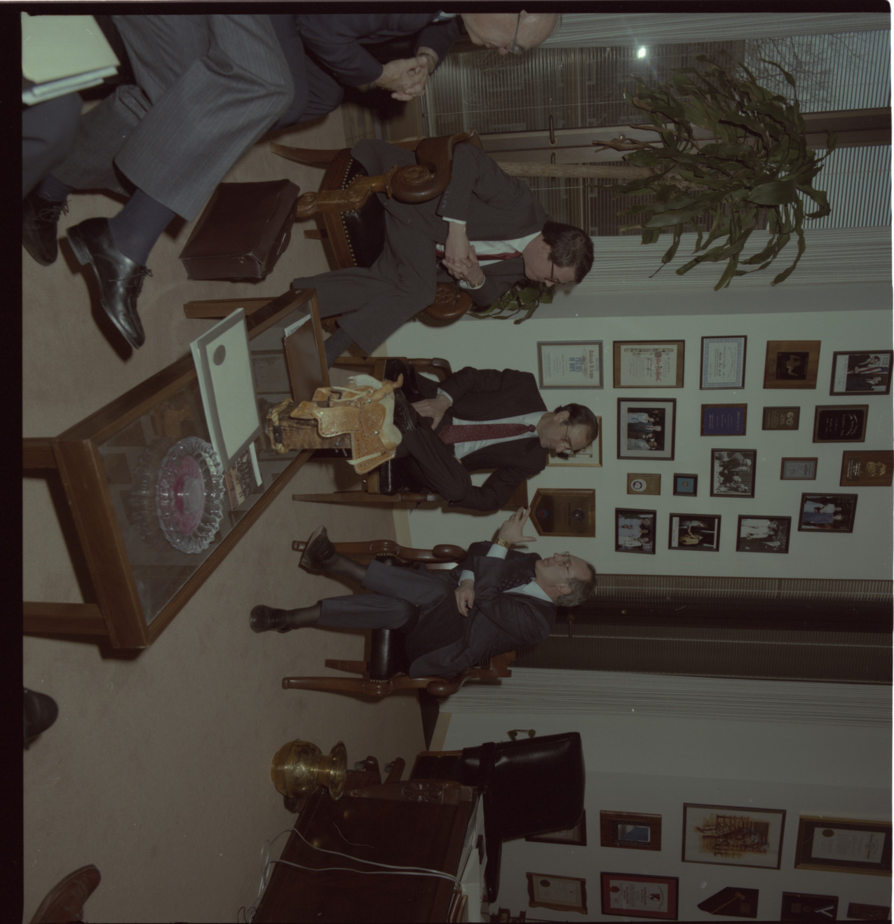 Film negatives of a meeting in the office of Senator Chic Hecht, March 22, 1988