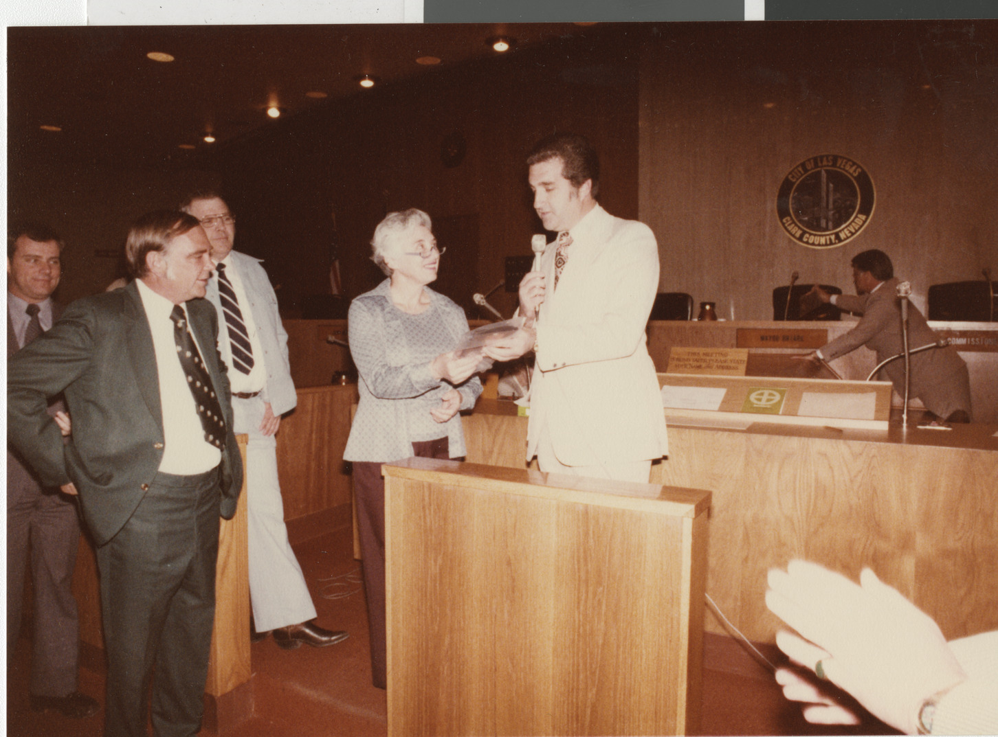 Photograph of Ron Lurie presenting certificate, circa 1978