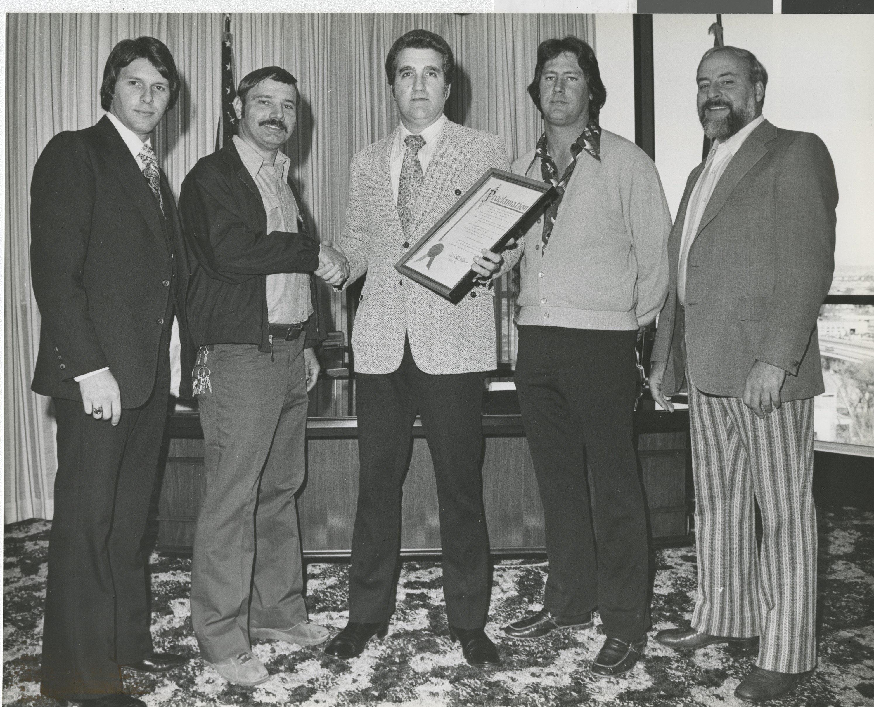 Photograph Ron Lurie presenting a proclamation, circa 1978