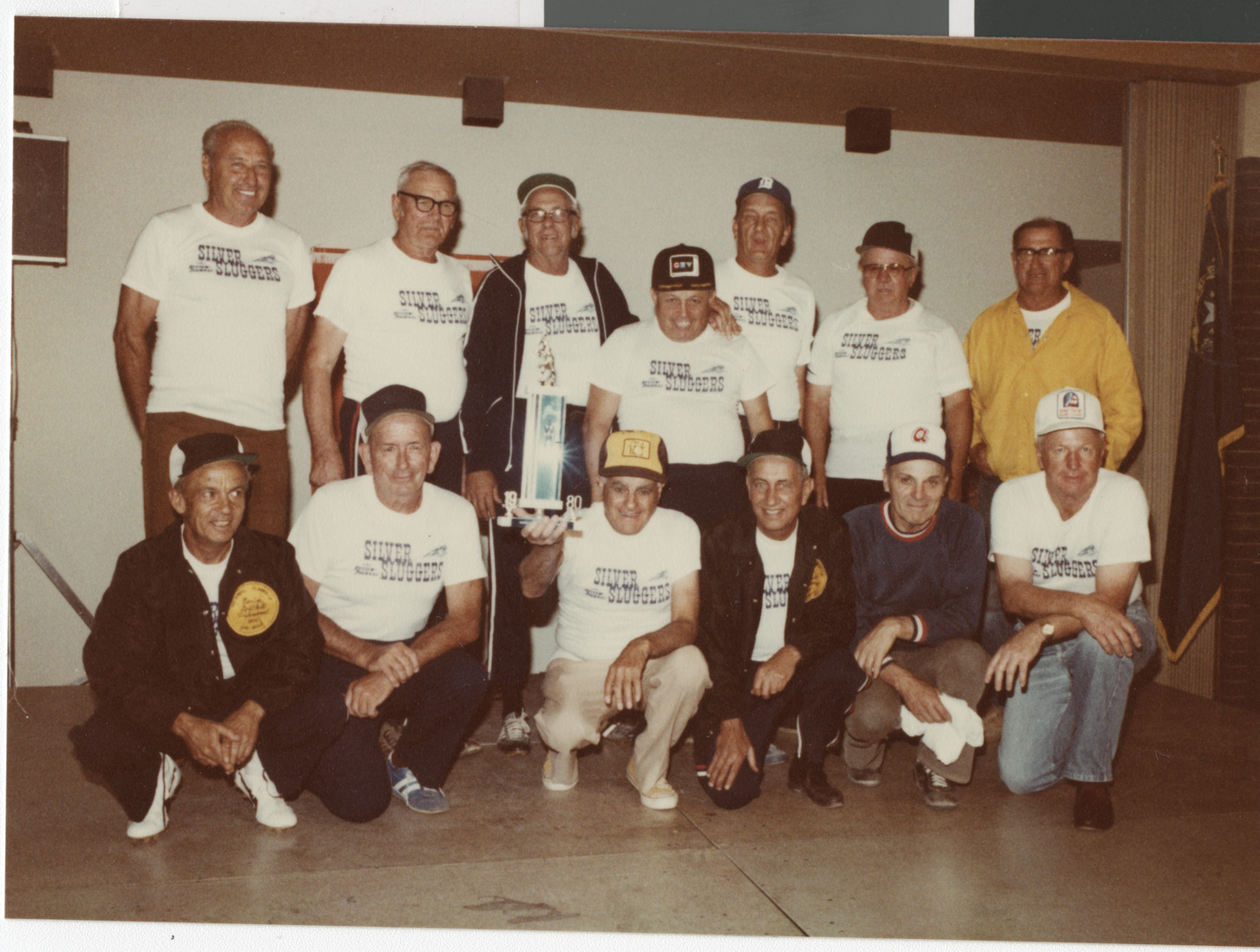 Photograph of a group of men with Silver Slugger t-shirts