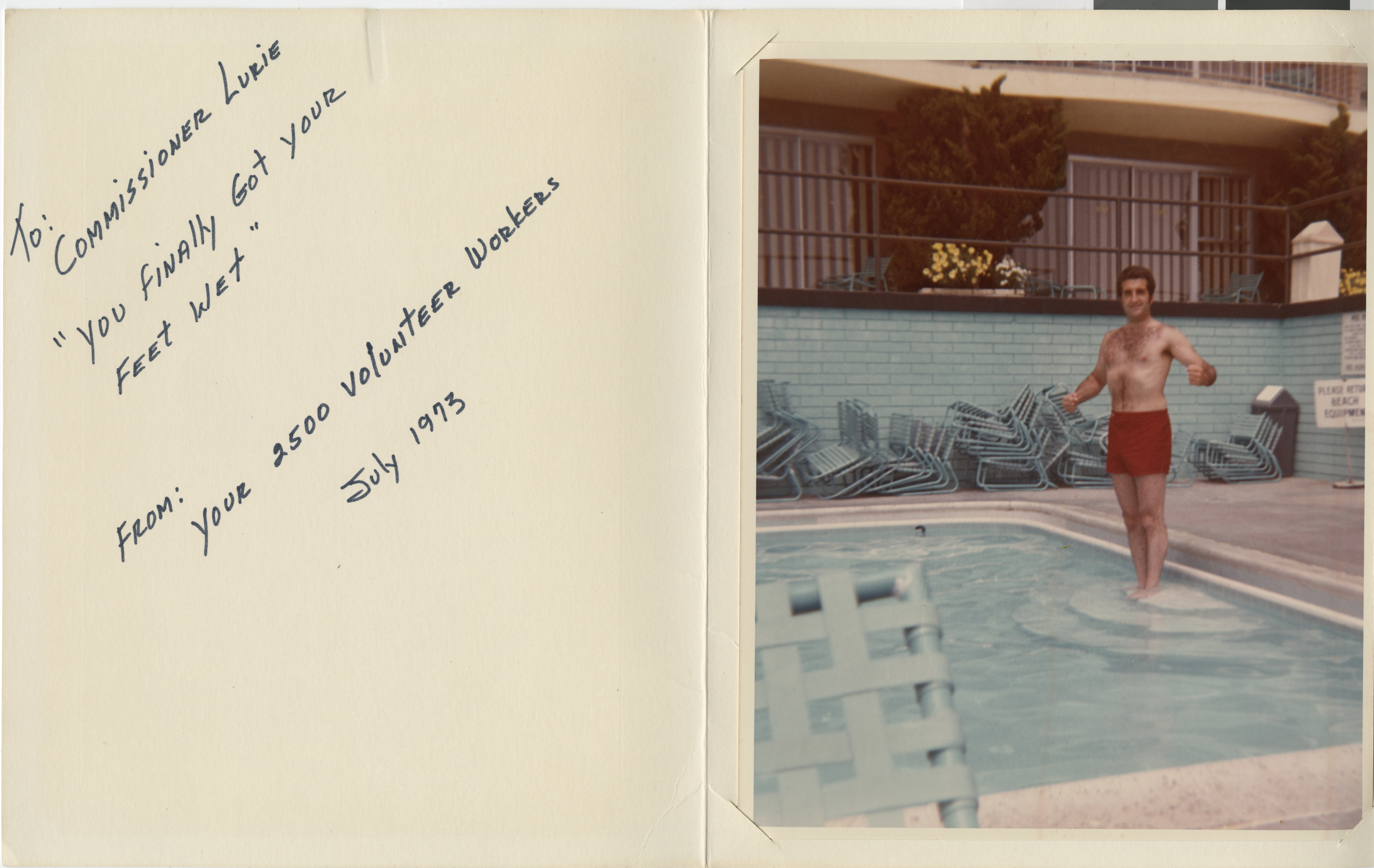 Photograph of Ron Lurie standing in a swimming pool, 1973