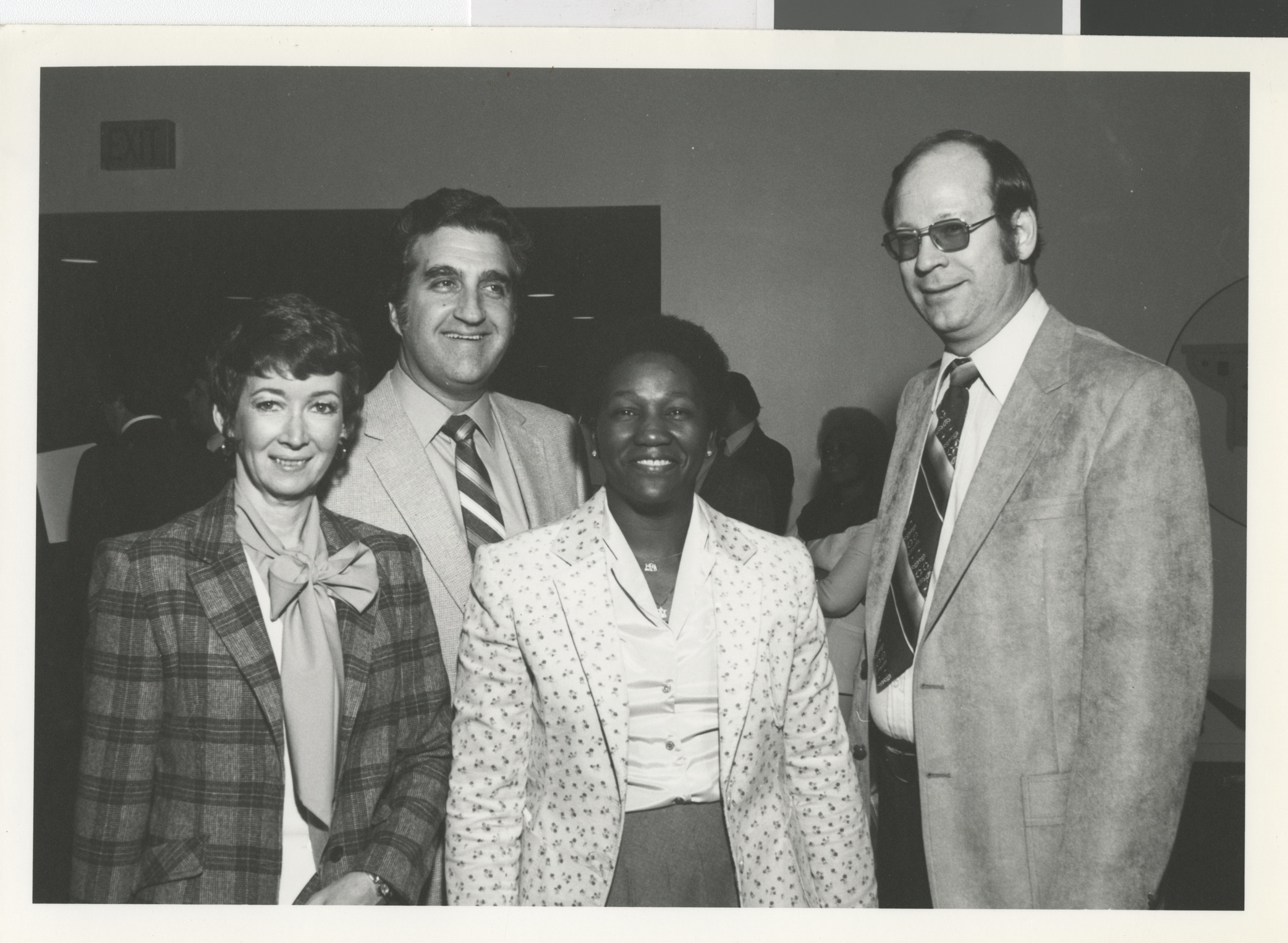 Photograph of Sandy Baxter, Ron Lurie, Virginia Brewster (CCSD Board member), and Ted Sanders (State Superintendent)