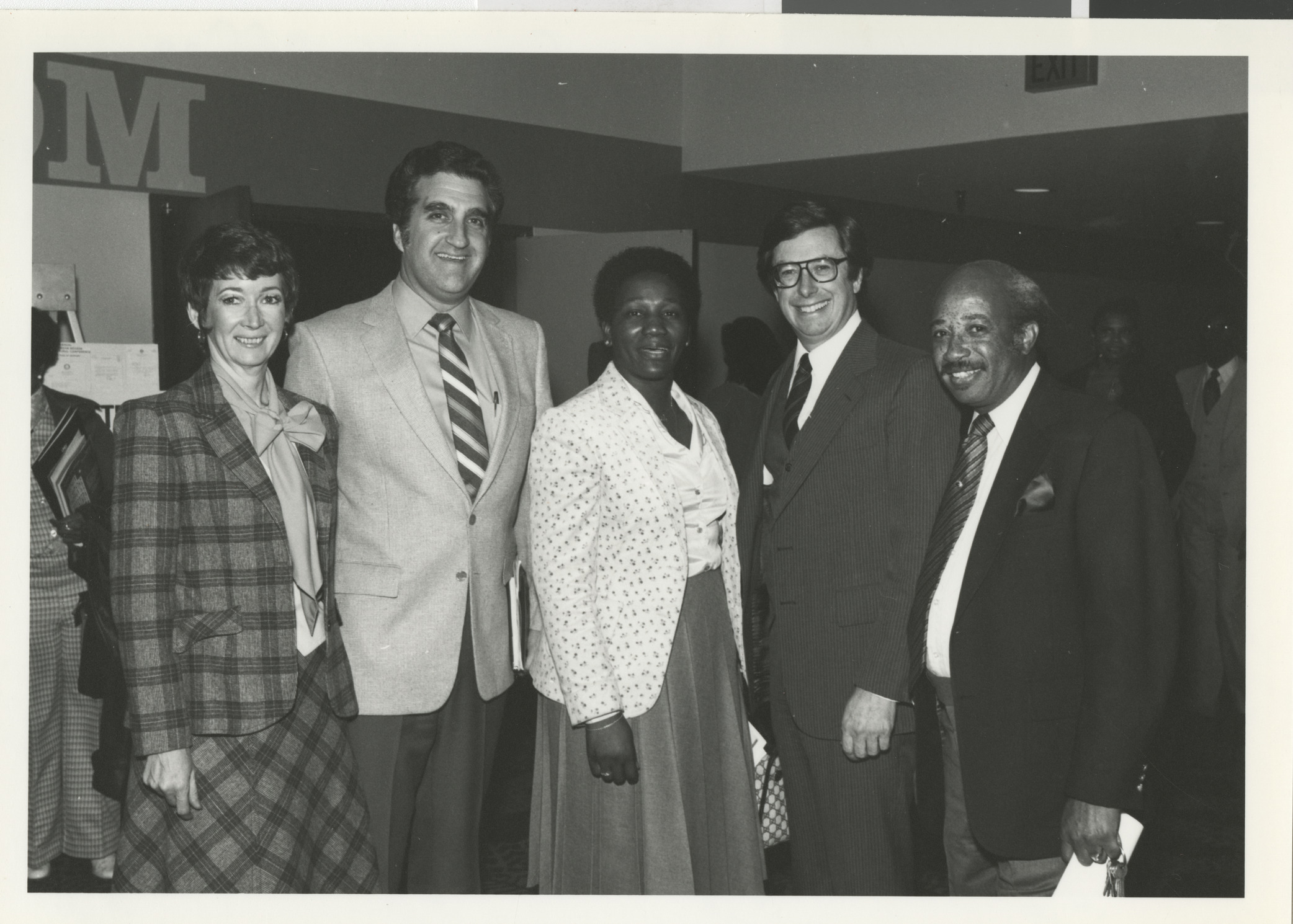Photograph of Sandy Baxter (Governor's Office), Ron Lurie, CCSD Board Member Virginia Brewster, Governor List, and NLV Commissioner Theron Goynes