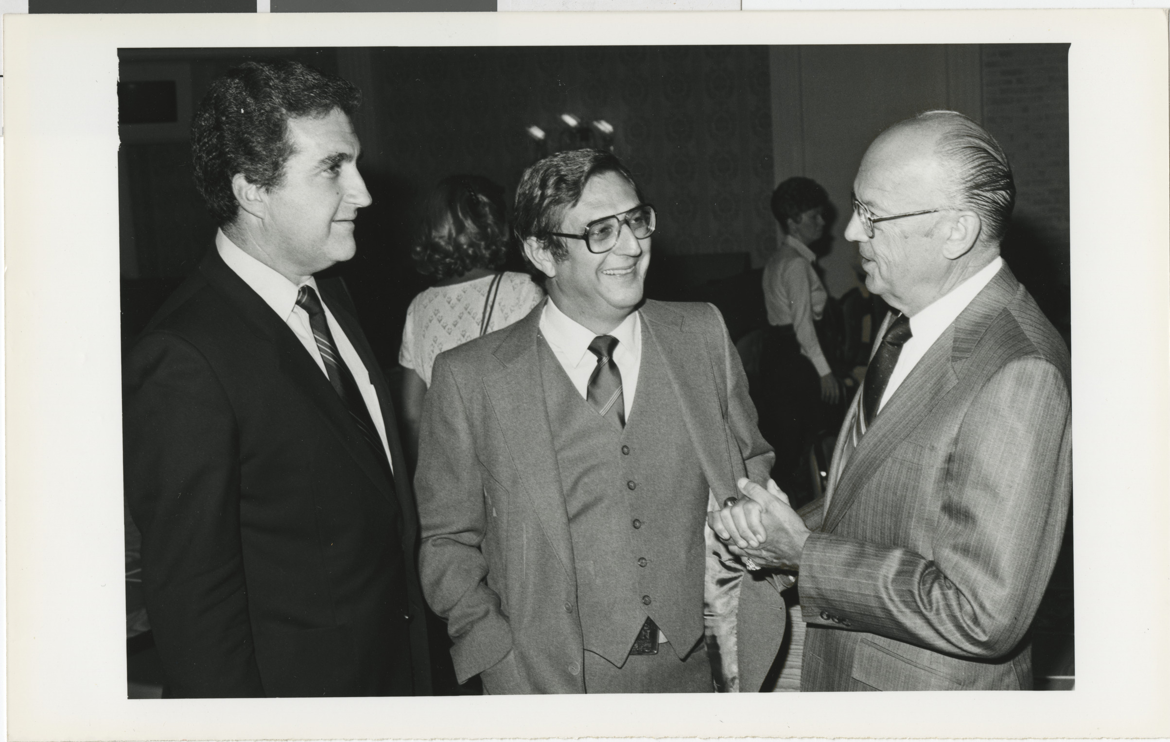 Photograph of Ron Lurie (left) with two men